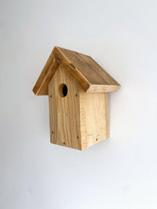 Houten vogelthuys