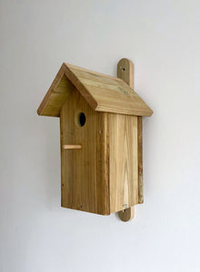 Houten vogelthuys